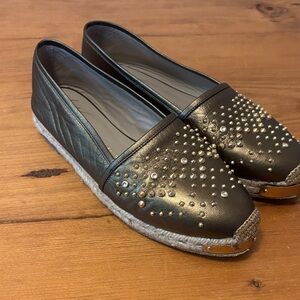 Giuseppe Zanotti's Gold Metallic Espadrilles are a size 7, adorned with studs